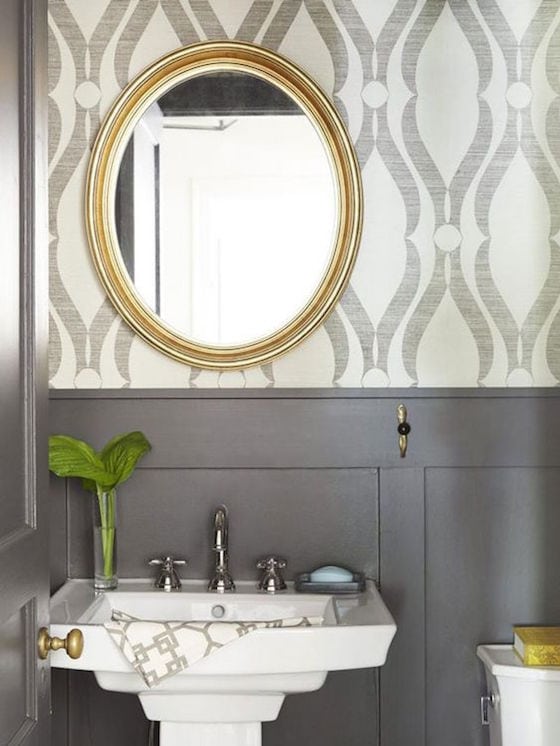 Gray and white wallpapered powder room