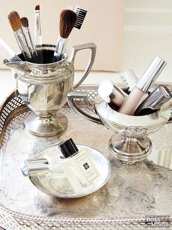 Use your silver in the bathroom to store makeup and brushes