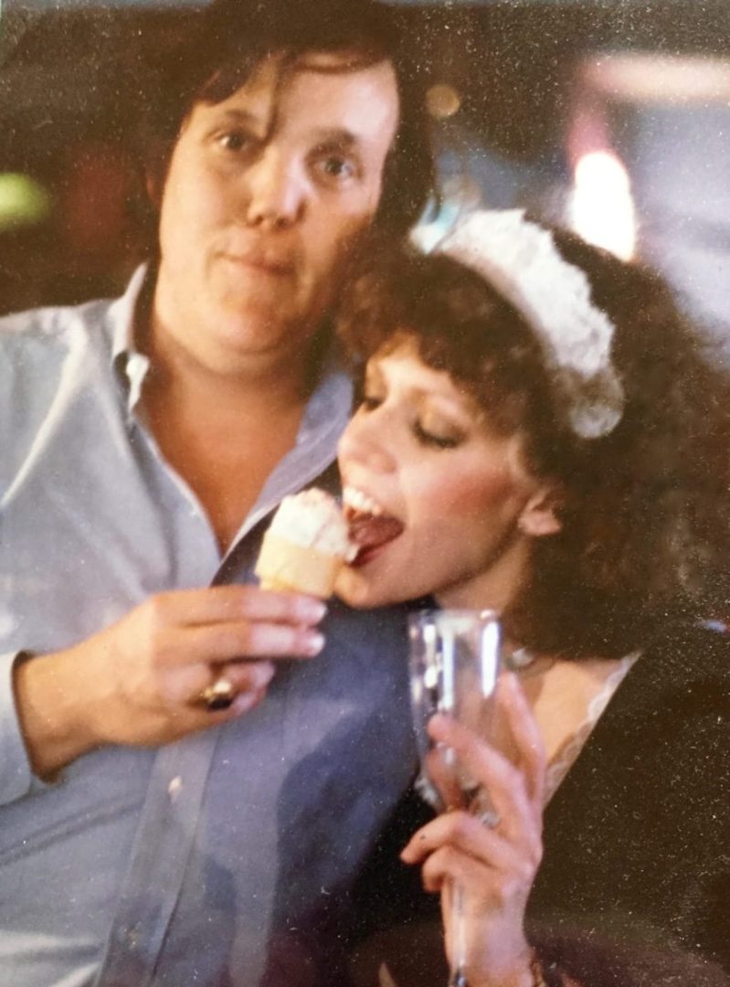 My friend and I when we were 23. I'd just won First Place at the Austin Spam-a-Rama with my 'Spam Wellington & Madera Sauce,' original recipe borrowed from Julia Child. I served it on a silver platter & was dressed in a short, French maid's outfit with black fishnets and high heels. We're eating Spamoni Ice Cream, which won Second Place. Photo by my first husband.